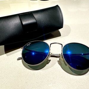 Ray-Ban round blue sunglasses.